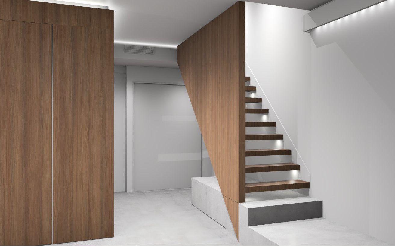 Escalier avec marches en bois et habillage vertical en bois dans un intérieur clair — chantier CAREN
